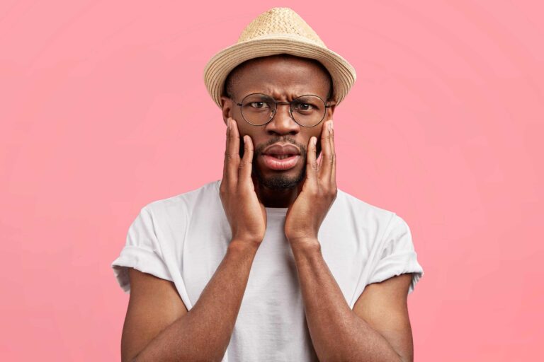 a man battling dental anxiety from bruxism